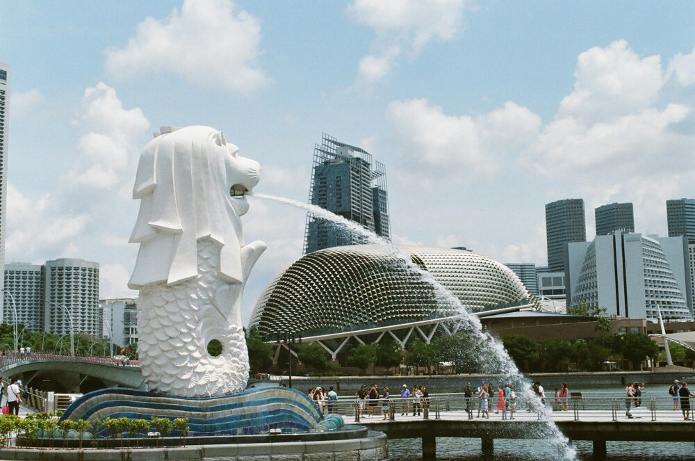 Singapores famous Lion Fountain with the Singapore skyline in the background