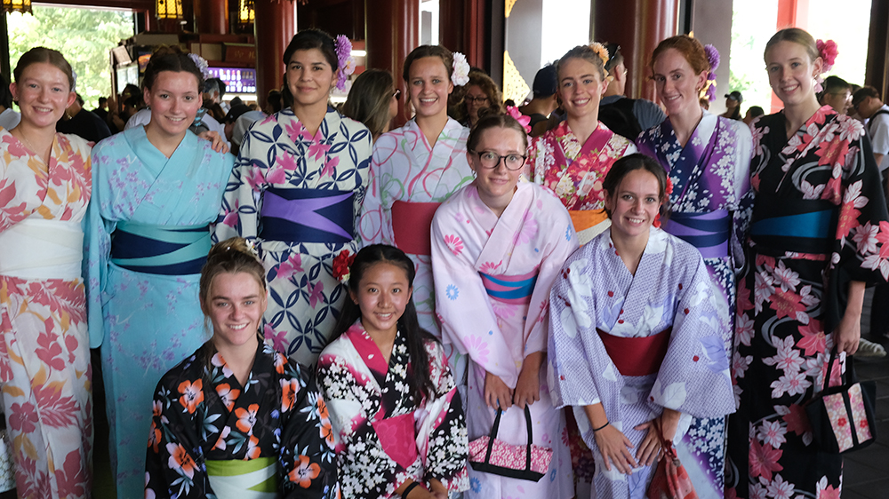 The team of 11 synchronised swimmers wearing kimono