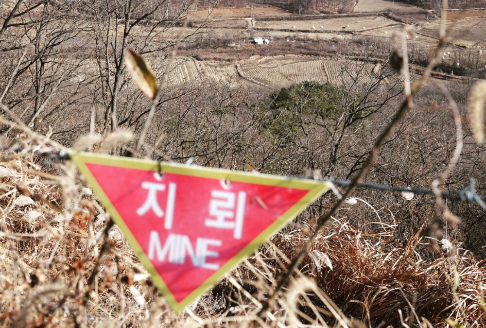 A sign warning of mines in rural Korea
