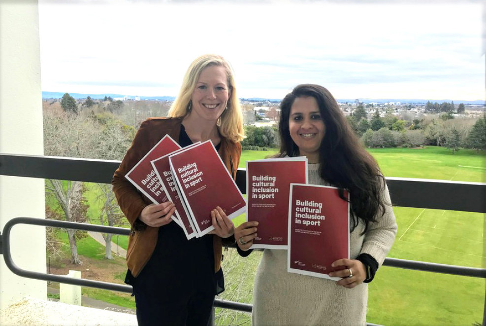 Professor Holly Thorpe and Dr Nida Ahmad with hard copies of their cultural inclusion report. Photo: Supplied