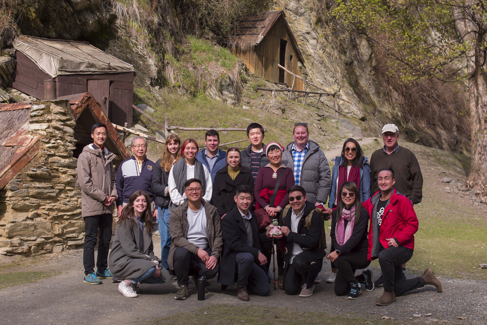 Hui participants gather for a group photo in front of the shacks that make up Arrowtown's historic Chinese Miners Camp
