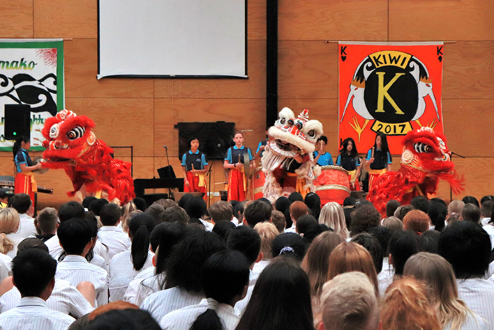 Students from Albany Junior High School Watching a Chinese Lion Dance