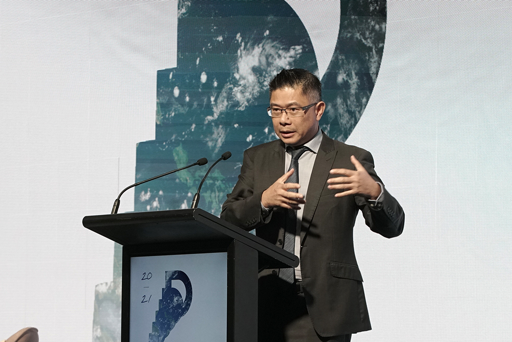 Pham addressing an audience at the Institute of Directors Conference