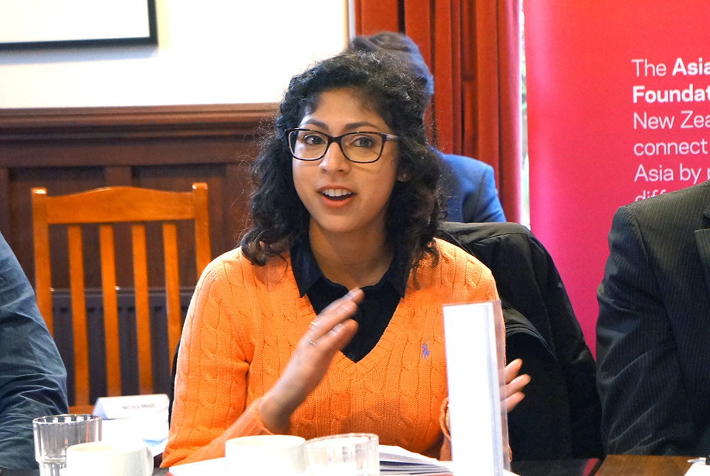A NextGen delegate speaking at a roundtable discussion