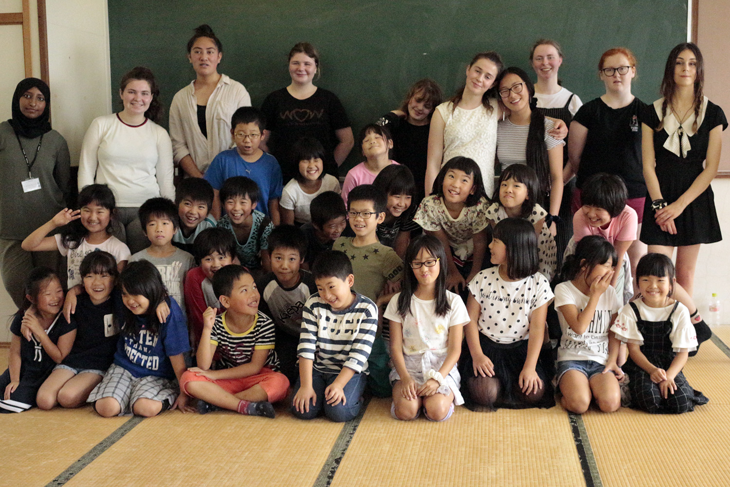 The Otagi Girls High School students with a class of junior students