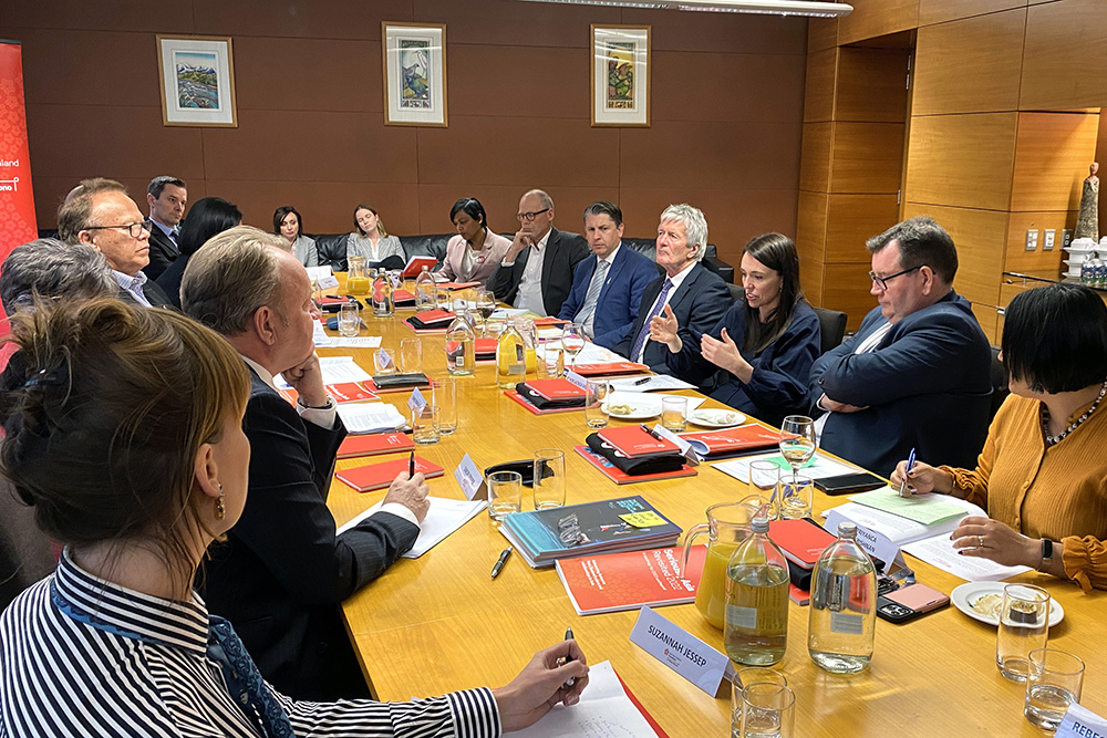 A long table with Foundation staff and board members on one side and Prime Minister Jacinda Ardern and MPs on the other