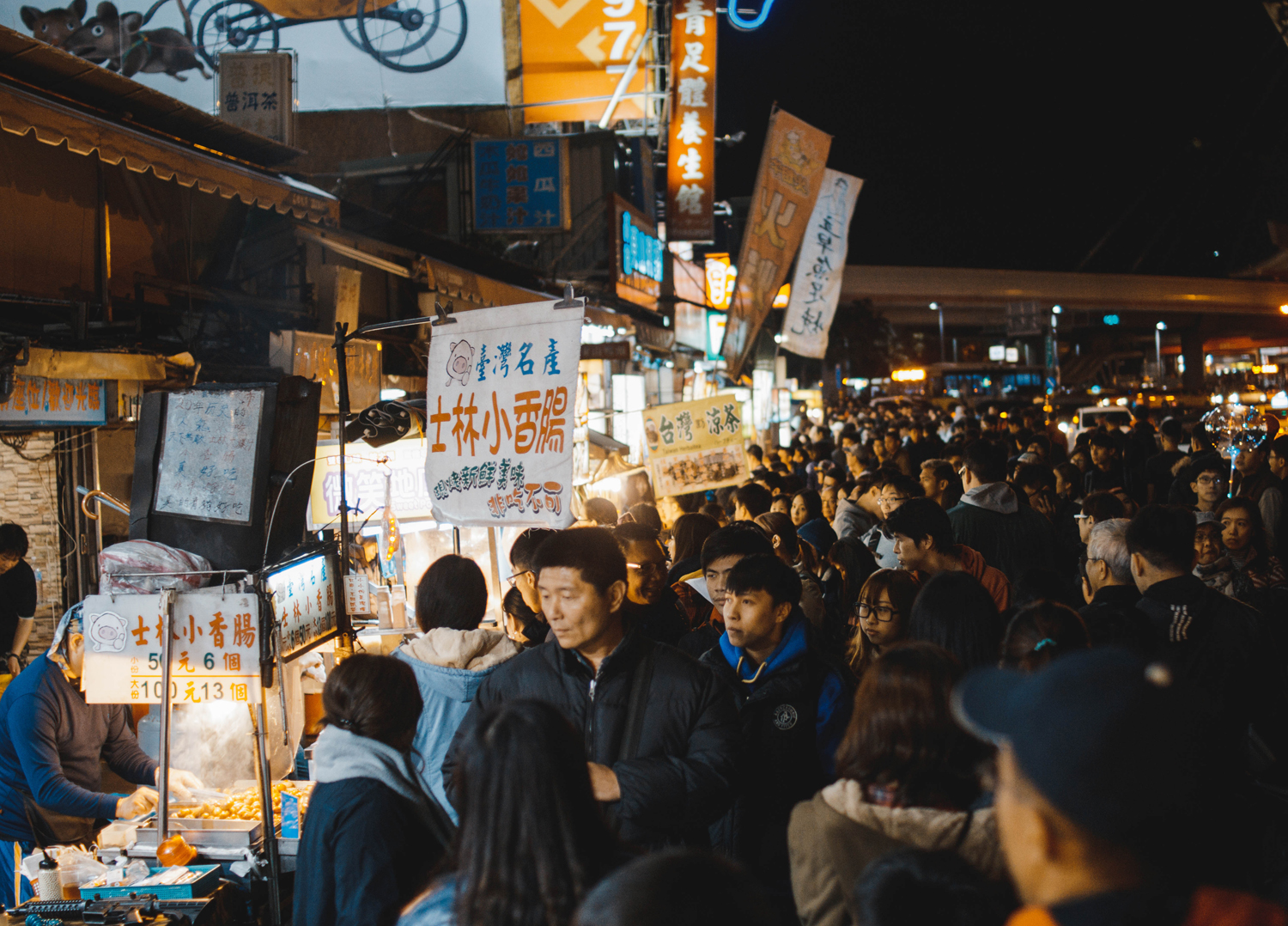 People milling around at a night market