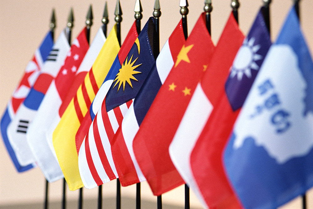 A line-up of Asian flags