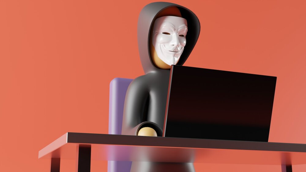 A model of a man wearing a mask while looking at a laptop