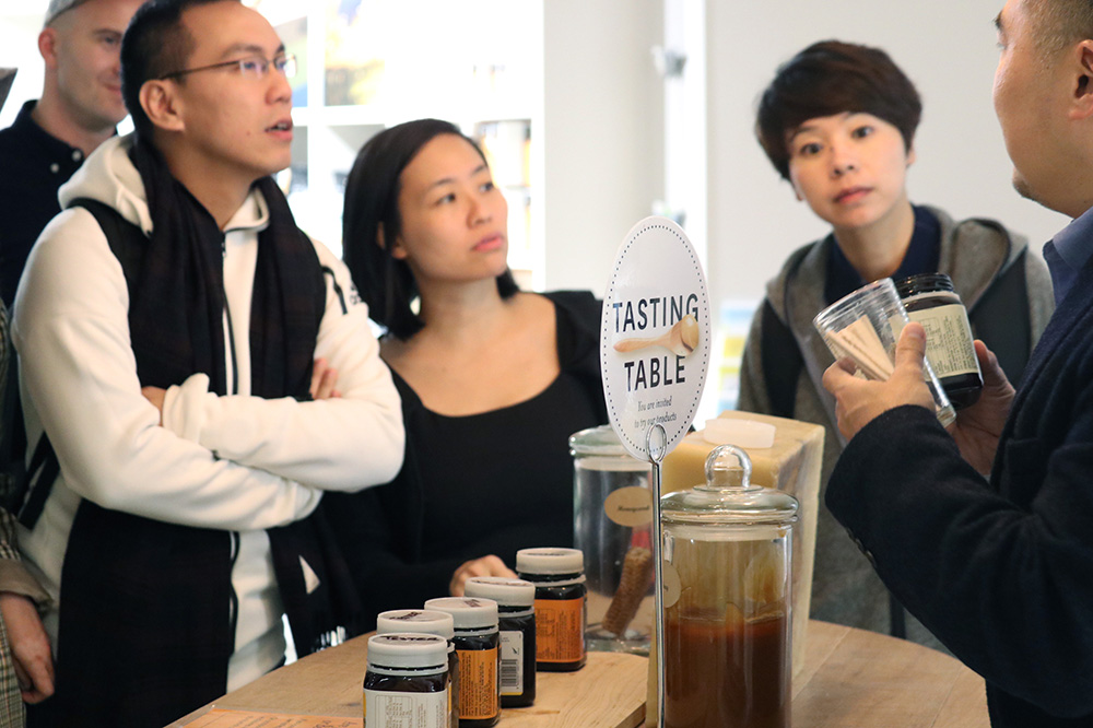 North Asia entrepreneurs tasting honey at Comvita New Zealand