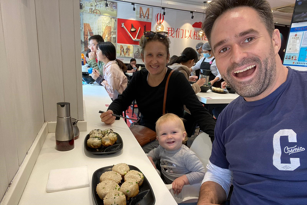 Richard and his family eating rice cakes at a diner