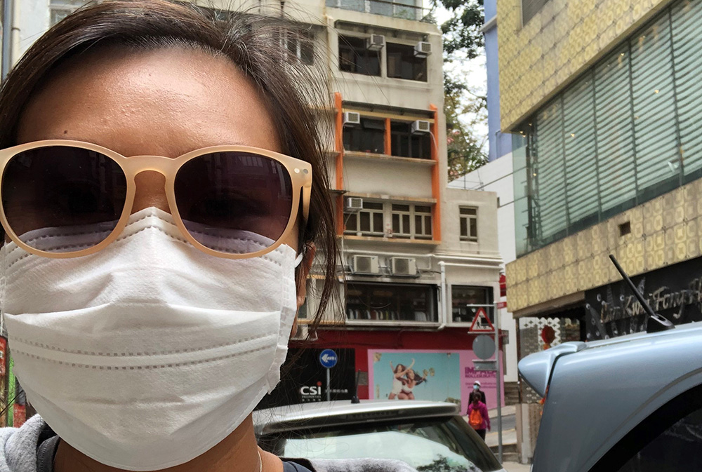 Leadership Network member Wei-Wei Ng wearing a facemask and dark glasses